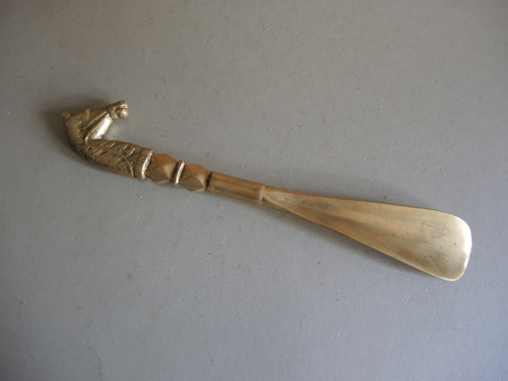 Vintage brass shoehorn / Horse head design on the… - image 1