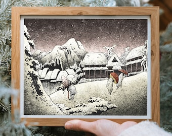 May include: A framed print of a snowy Japanese village scene with a mountain in the background. The print is in black and white with a touch of red for the roof of a building.