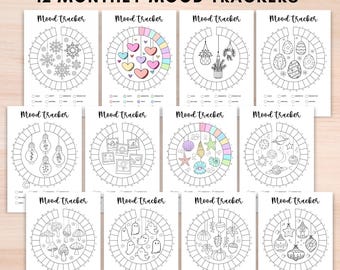 May include: Twelve printable and digital mood trackers in a bullet journal style. Each tracker features a different monthly theme with a circle divided into 31 sections for daily tracking. The themes include snowflakes, hearts, hanging plants, Easter eggs, light bulbs, photos, seashells, planets, mushrooms, ghosts, pumpkins, and ornaments.