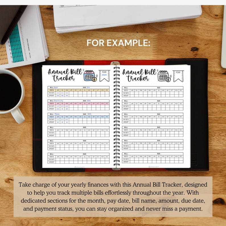 May include: A black and red spiral bound notebook with a white title "Annual Bill Tracker" and a hand-drawn calendar icon. The notebook is open to a page with a grid for tracking bills throughout the year.