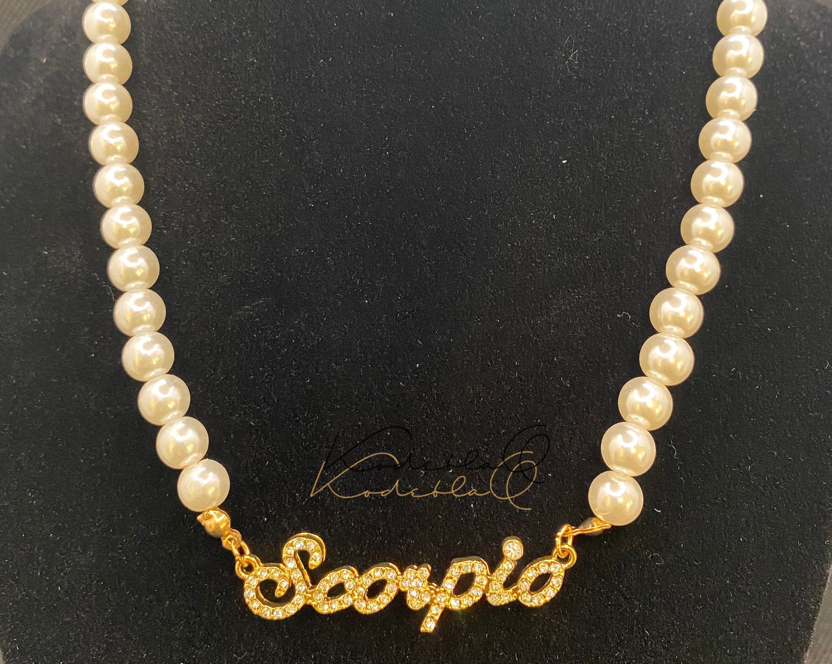 Scorpio pearl necklace deals
