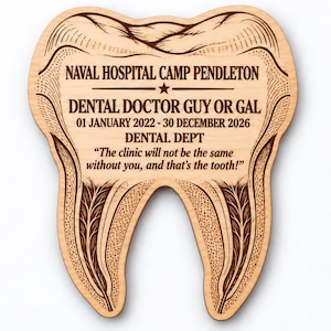 May include: A light-colored wooden plaque shaped like a tooth with dark brown laser-engraved details. It features the text NAVAL HOSPITAL CAMP PENDLETON, DENTAL DOCTOR GUY OR GAL, 01 JANUARY 2022 - 30 DECEMBER 2026, DENTAL DEPT, and the quote The clinic will not be the same without you, and that's the tooth!