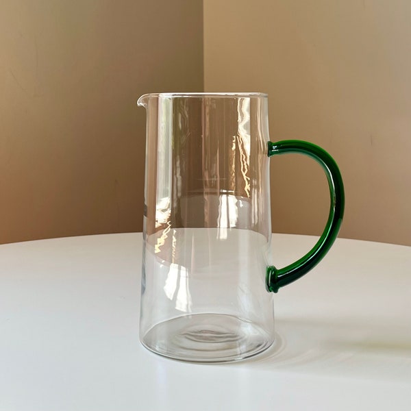 Sleek Glass Pitcher with an Emerald Green Glass Handle