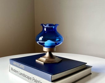 Bronze Metal Hurricane Candle Lamp with a Cobalt Blue Glass Cover