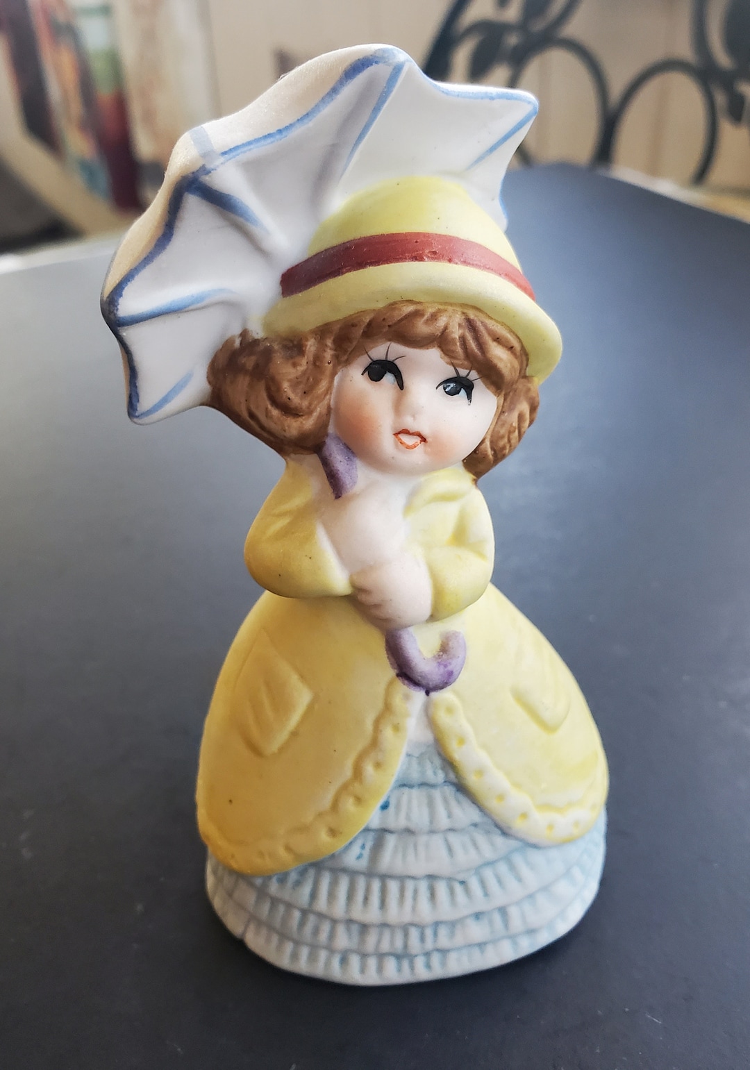 Porcelain Bisque Girl in Yellow Raincoat With Umbrella Bell Jasco