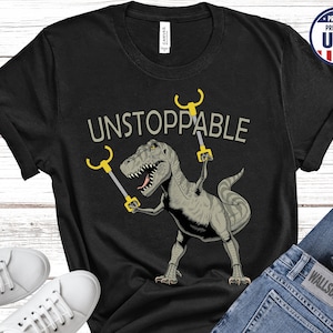 Funny Graphic Dinosaur Shirt, Unstoppable Dinosaur Shirt, T-Rex Shirt, Gift for Dinosaur Lover, Jurassic Style Shirt, Cool Dinosaur Tee Black