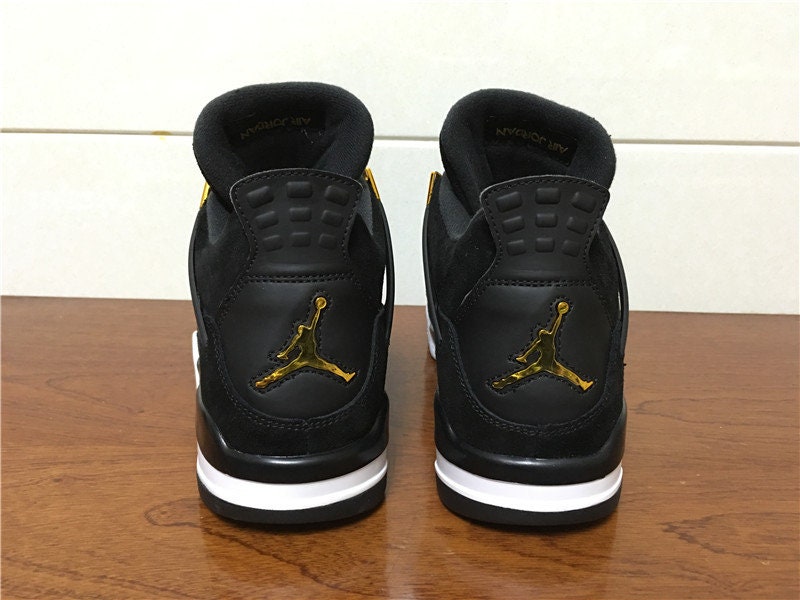 jordans 4 black and gold