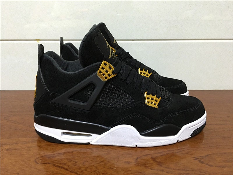 jordans 4 black and gold