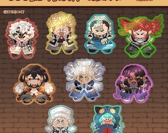 May include: A collection of eight 2.5-inch acrylic charms featuring stylized chibi characters with diverse hair colors, outfits, and expressions. The top banner displays the text GOOBIE-AKUTA CHARMS and 2.5" ACRYLIC CHARMS. Each charm has a distinct colored border.