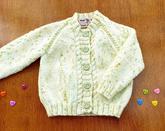 3-6 Months Tea Green Hand Knitted Baby Cardigan, pale pastel green girls cardigan with yellow and green coloured flecks