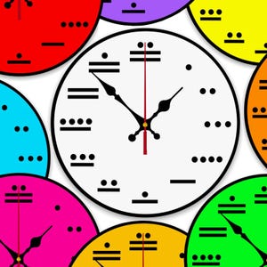 May include: A collection of colorful, round clocks with black hands and minimalist hour markers. The clocks are in various colors, including red, purple, yellow, green, and pink, with a white clock in the center.