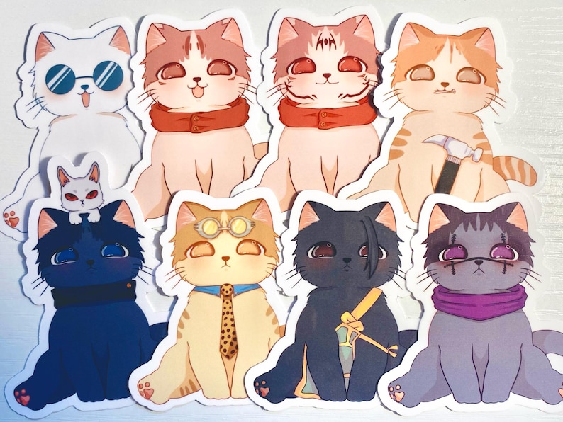 May include: A set of nine stickers featuring cartoon cats in various poses and outfits. The cats are all wearing different accessories, such as glasses, scarves, and hats. The stickers are printed on white paper and have a glossy finish.