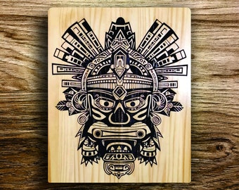 Real wood engravings of Gods and deities from Aztec mythologyc