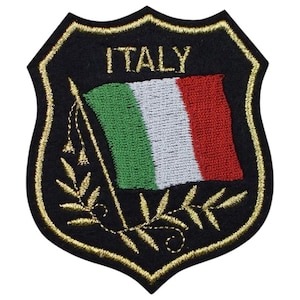 May include: Embroidered patch featuring the word "ITALY" above a flag with green, white, and red stripes. The patch has a black background with a gold border and decorative gold accents.