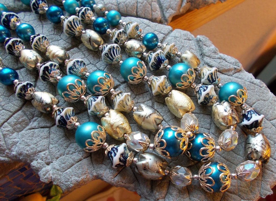 Vintage Costume 3 Strand Necklace, Japan Costume Jewelry, Faux Teal Pearls, 50s 60s Costume Jewelry, Faux Pearl Clip on Earrings, Bicone - Etsy Vintage Costume 3 Strand Necklace, Japan Costume Jewelry, Faux Teal Pearls, 50s 60s Costume Jewelry, Faux Pearl Clip on Earrings, Bicone - Etsy
