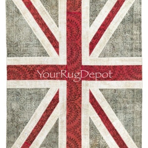 May include: A patchwork rug with the Union Jack flag design. The rug is made of different pieces of fabric in shades of white, red, and gray. The red sections of the flag have a floral pattern.