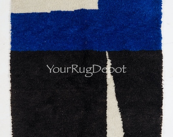 Contemporary Hand Knotted Moroccan Wool Rug in Blue, Black and Cream. Custom Options Available. BT105