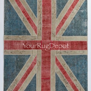 May include: A vintage-style rug with a patchwork design featuring the Union Jack flag. The rug is made of different colored fabrics, including red, white, and blue. The rug is a great way to add a touch of British style to your home.