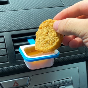 Dip sauce clip for car air vent