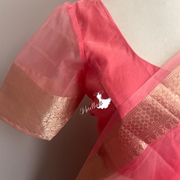 Pink organza saree with stitched blouse