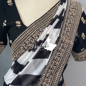 Beautiful Georgette Saree with Embroidery Border and stitched blouse