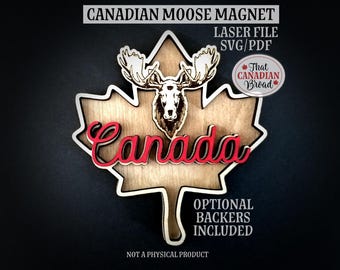 May include: Laser cut wooden magnet featuring a moose head inside a maple leaf with the word "Canada" in red lettering. The magnet is for sale as a digital download file.
