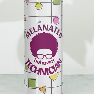 May include: A white stainless steel tumbler with a geometric pattern in pink, yellow, green, and blue. The tumbler has a purple silhouette of a person with an afro and glasses and the text "Melanated Behavior Technician".