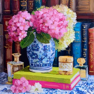 May include: A still life painting showing a blue and white vase with pink and yellow hydrangeas. The vase is on a stack of books, with perfume bottles and a decorative jar. A collection of books forms the backdrop.