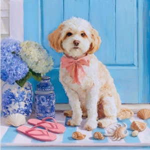 May include: A light-colored dog with a pink bow sits in front of a blue door. Pink flip-flops, seashells, and blue and white floral vases are in the foreground. The dog has light brown ears and a pink bow.