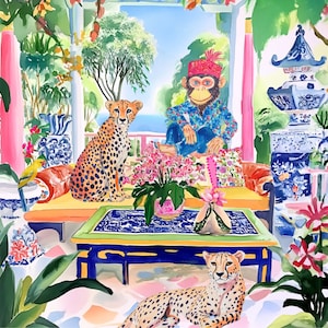 May include: A watercolour painting depicting a whimsical scene featuring a monkey wearing a blue shirt and a red hat seated on a sofa with two cheetahs. The monkey is holding a flower. The sofa is adorned with colourful cushions and a floral pattern. A table with a blue and green patterned top stands in front of the sofa. The scene is set in a tropical garden with lush greenery and flowers.