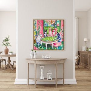 May include: A painting of five dogs playing cards around a green table in a pink room. The dogs are wearing collars and are sitting on chairs. The room has a pink wall and a green floor. There is a chandelier hanging from the ceiling.