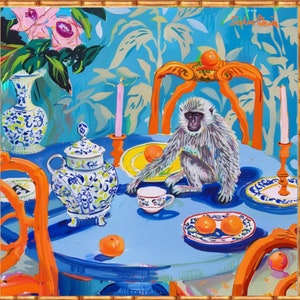 May include: A blue and white porcelain teapot with a lid sits on a blue table with a monkey, two orange fruits, and a blue and white plate. The table is set with two orange chairs and a blue and white patterned tablecloth. The background is a blue and green floral pattern.