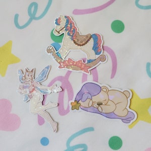 Holographic Sticker Set - Rock-a-Bye Pony, Sleep Tight Teddy, and Fawny Fairy Die Cut Stickers