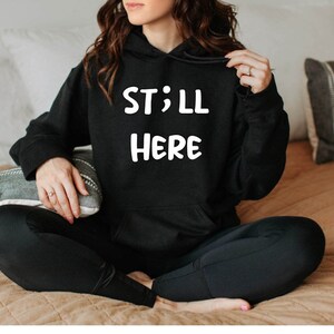 Still here hoodie, st;ll here hoodie, mental health hoodie, bell lets talk day, mental health awareness, hoodies, custom hoodies, trending