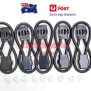 May include: Set of six black elastic loops with a buckle on each end. The loops are designed to hold items together, such as a blanket or a towel.