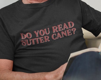 Do you read Sutter Cane? | Unisex Short Sleeve Tee | John Carpenter