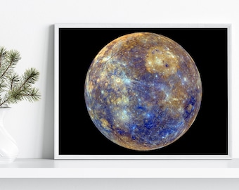 May include: A close-up image of Mercury, the smallest planet in our solar system. The planet is shown in a realistic color, with a dark blue and brown surface. The image is set against a black background.