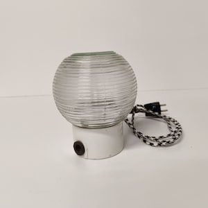 Vintage porcelain table lamp with glass ball, can also be used as a wall lamp and can also be used as a wall lamp. 1970s lamp.