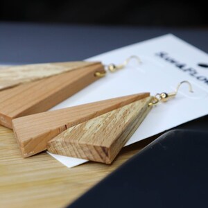 Two triangles and wood types earrings.