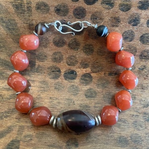 Vintage twist cut carnelian bead bracelet with antique Himalayan agate and Ethiopian silver
