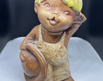 Vintage Stoneware Pottery Boy Figurine Blonde in Overalls with Hat Folk Art