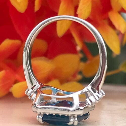 Blue shops Topaz London Ring, 14K White Gold, Inlaid with 34 quality diamonds D,E, VS with a 4-Carat gemstone London Blue Topaz