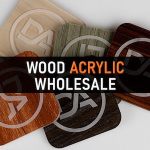 May include: Four different wooden coasters with a circular design featuring the letters "DA" in white. The coasters are in various wood tones, including light brown, dark brown, and a reddish brown. The text "WOOD ACRYLIC WHOLESALE" is displayed in white letters on a black background.