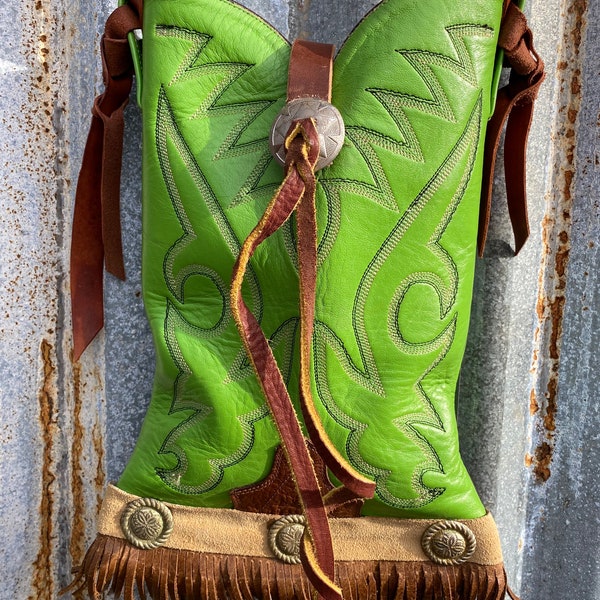 Re-purposed cowboy boot for a one of a kind cross bag.