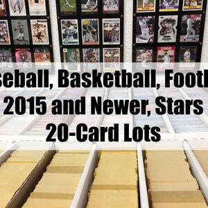 May include: A collection of baseball, basketball, and football trading cards organized in rows of 20-card lots. The cards are from 2015 and newer, and feature star players. The image includes a sign that reads "Baseball, Basketball, Football 2015 and Newer, Stars 20-Card Lots."