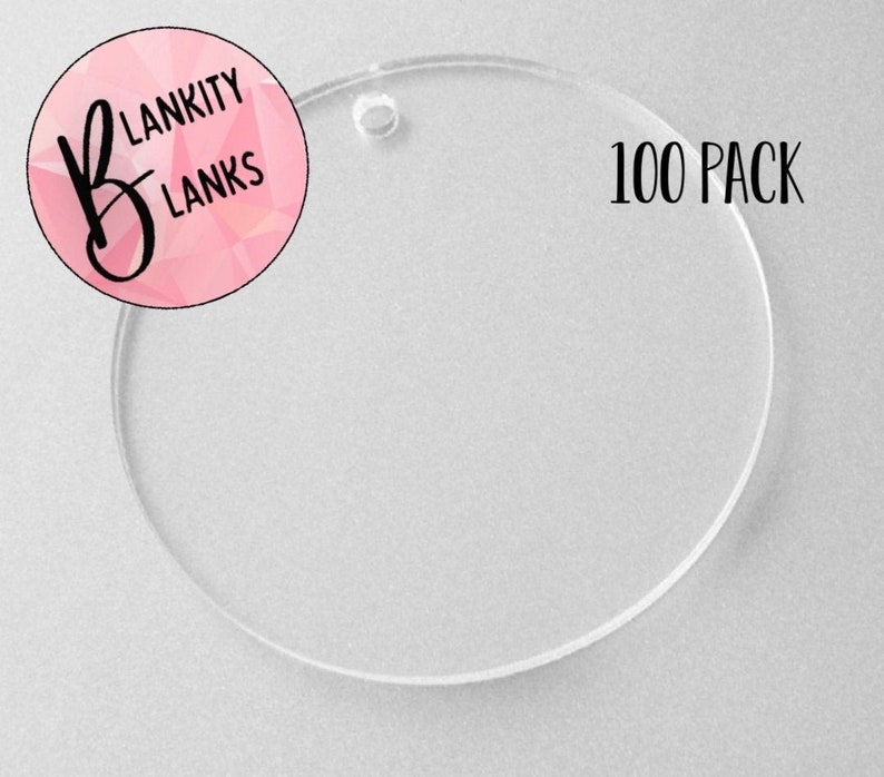 K&ouml;nnte beinhalten: Eine Packung mit 100 transparenten runden Acrylrohlingen mit einem Loch oben. Die Rohlinge haben einen Durchmesser von 5 cm und sind perfekt zum Basteln.