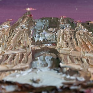 May include: An oil painting on canvas featuring a thick impasto technique with visible brushstrokes. The artwork depicts a cathedral-like structure in shades of brown, tan, and white, set against a deep purple background with small red accents.