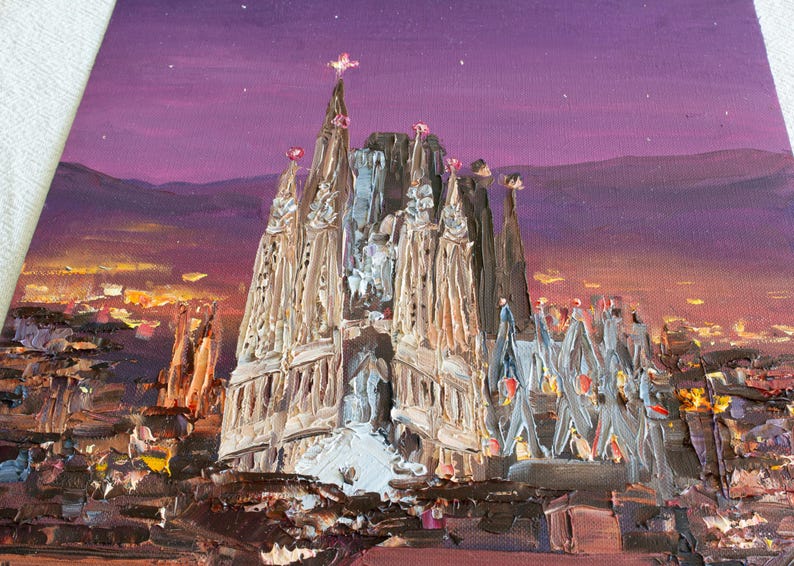 May include: An oil painting on canvas depicting the Sagrada Familia at twilight. The structure features textured, impasto brushstrokes in shades of beige and brown against a vibrant purple sky. The surrounding city glows with warm orange lights.