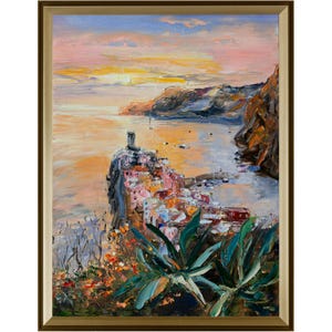 Fishing village of Vernaza in the Cinque Terre National Park in Italy and a view of the Gulf of Genoa...