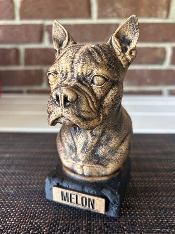 Hand-painted custom dog statue with a personalised name plate